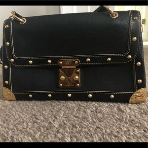 Louis Vuitton Le Talentueux black goatskin leather